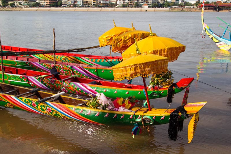 Racing boats with traditional decoration at the Water Festival in Phnom Penh, Cambodia in 2010.