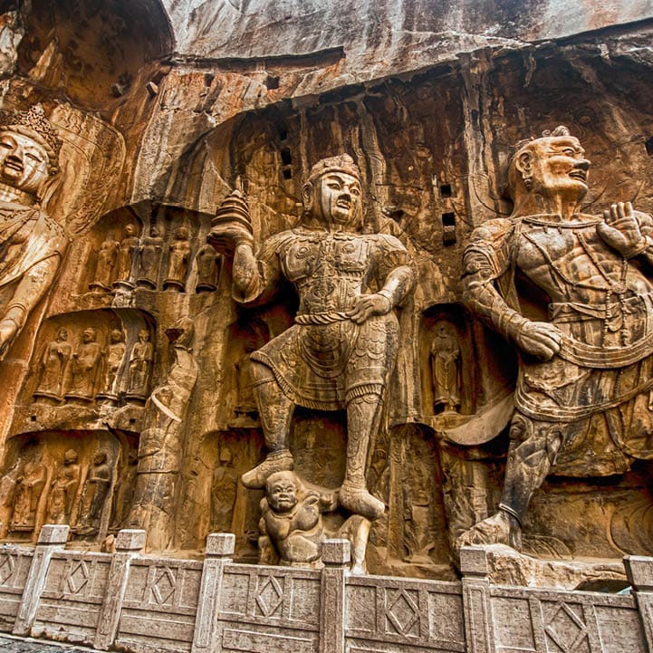 LUOYANG, CHINA - OCTOBER 28: Visitors at Longmen grottoes on October 28, 2007.It is one of the four notable grottoes in Luoyang,Henan,China . A UNESCO World Heritage Site.