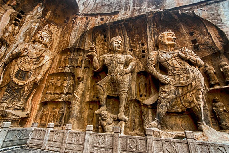 LUOYANG, CHINA - OCTOBER 28: Visitors at Longmen grottoes on October 28, 2007.It is one of the four notable grottoes in Luoyang,Henan,China . A UNESCO World Heritage Site.