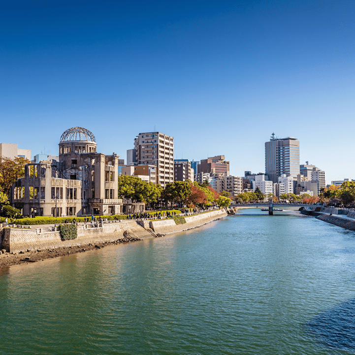 Hiroshima Cityscape on a Sunny Autumn Day. View over the Motoyasu River, Atomic Bomb Dome on the left side of the Motoyasu River. Naka Ward, Hiroshima, Japan, Asia.
