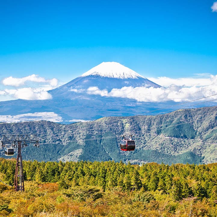 Ropeway and view of Mountain Fuji from Owakudani, Hakone. Japan.