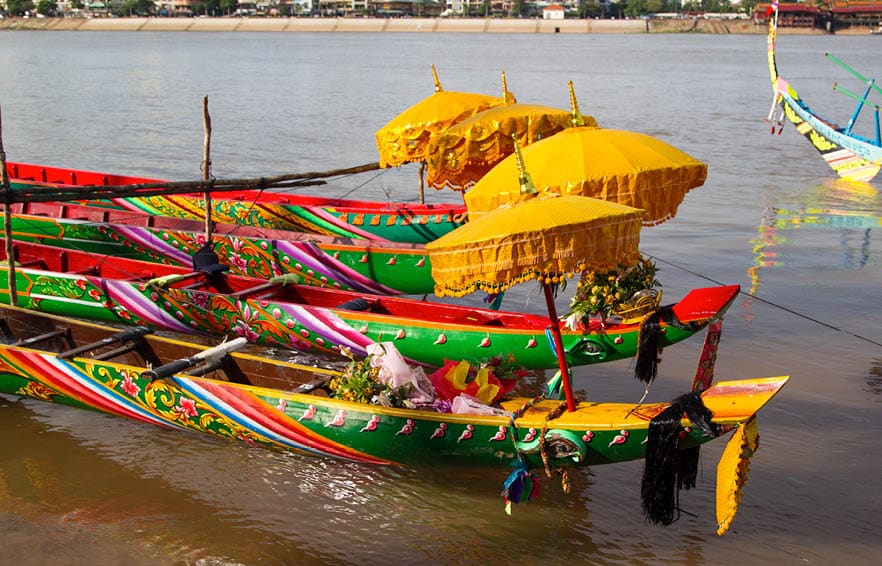 Racing boats with traditional decoration at the Water Festival in Phnom Penh, Cambodia in 2010.