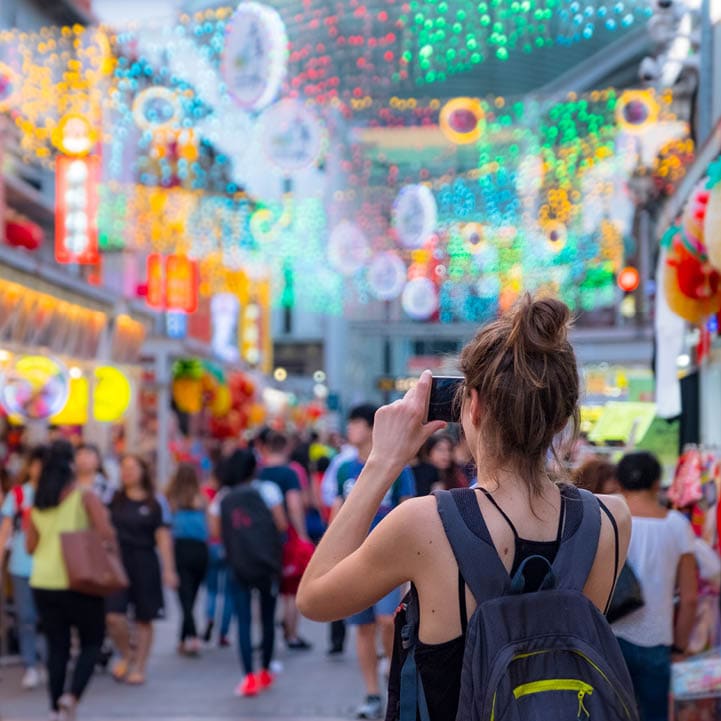 2019 March 1st, Singapore, Chinatown - People walking and shopping on the street market after sunset.