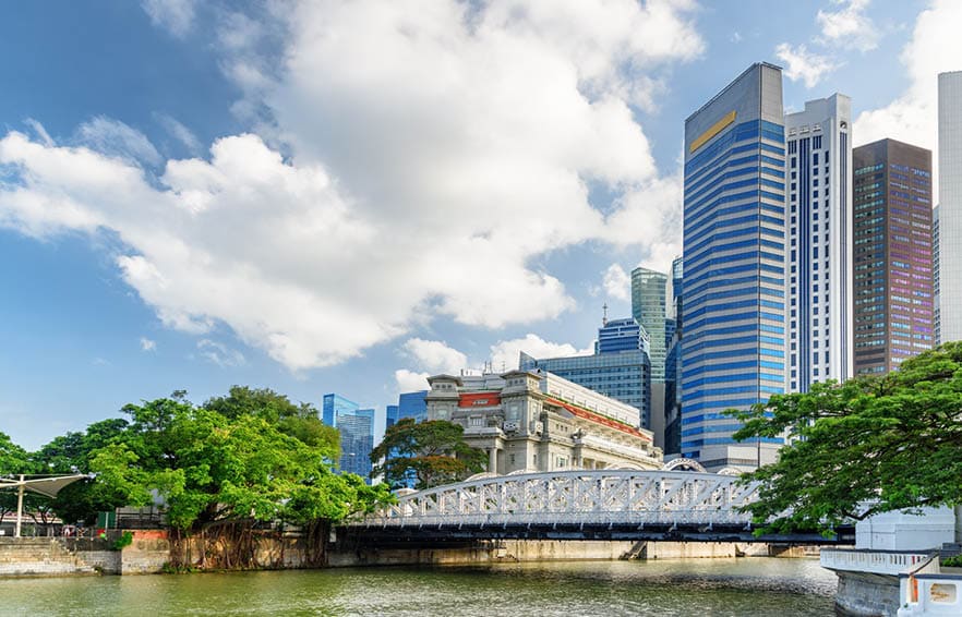 Scenic view of skyscrapers and Anderson Bridge in Marina Bay in Singapore. Beautiful summer cityscape. Singapore skyline. Singapore is a popular tourist destination of Asia