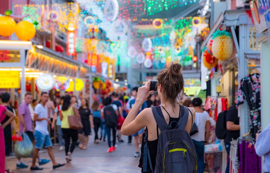 2019 March 1st, Singapore, Chinatown - People walking and shopping on the street market after sunset.
