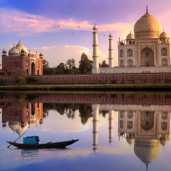 Taj Mahal is a white marble mausoleum on the banks of the Yamuna river built by Mughal Emperor Shah Jahan. A UNESCO World Heritage site at Agra, India. Photograph taken from Mehtab Bagh.
