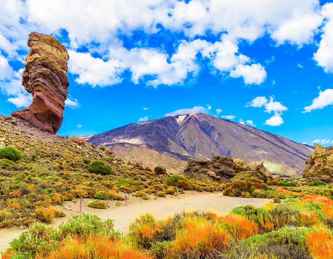 View of Roques de Garcia formation and Teide mountain volcano in Teide National Park, Tenerife, Canary Islands, Spain.
