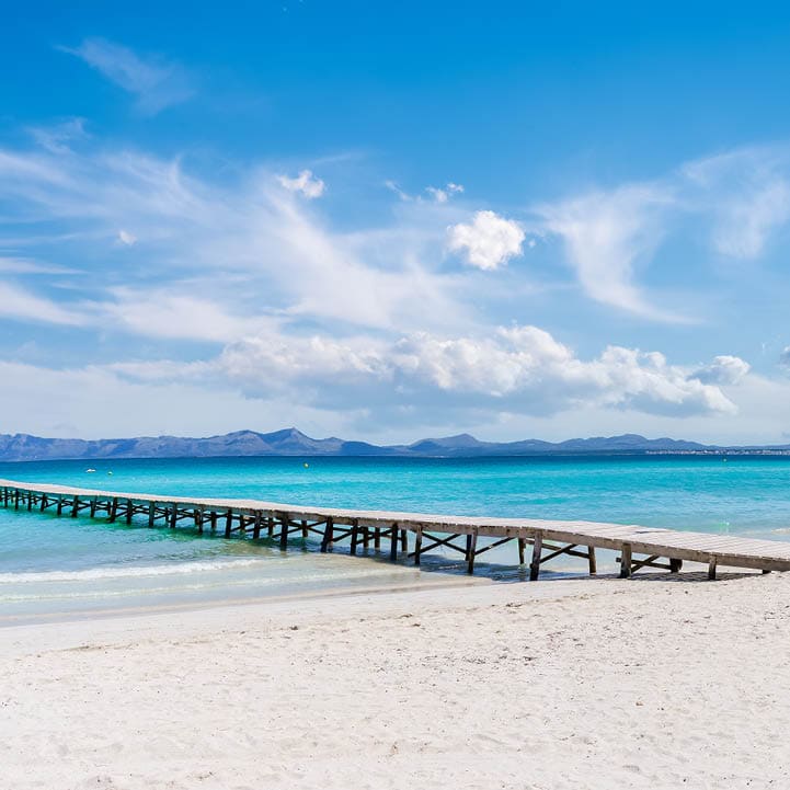 Landscape with boardwalk at the coastline of Platja de Muro in Alcudia bay, Majorca Island, Spain