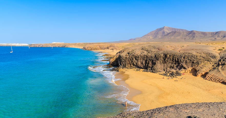 Turquoise ocean water on Papagayo beach, Lanzarote, Canary Islands, Spain