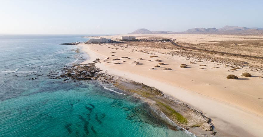 Corralejo flag beach aerial drone shot, Fuerteventura, Canary Islands