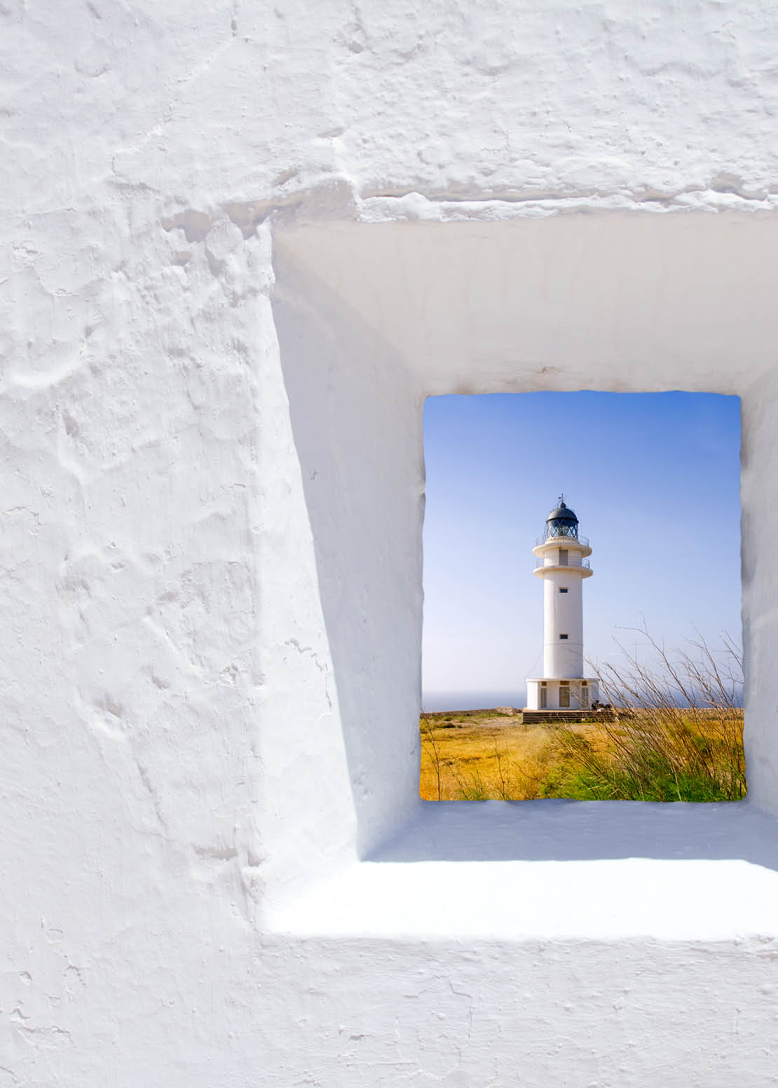 Formentera mediterranean white window with Barbaria lighthouse