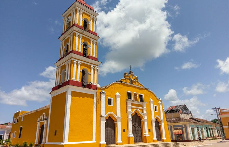 Yellow colonial style church of Iglesia Major in the city of Remedios, Cuba