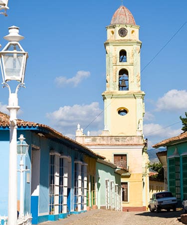 The tower of the San Francisco Convent seen from the Plaza Mayor, the center of the colonial city of Trinidad, Cuba