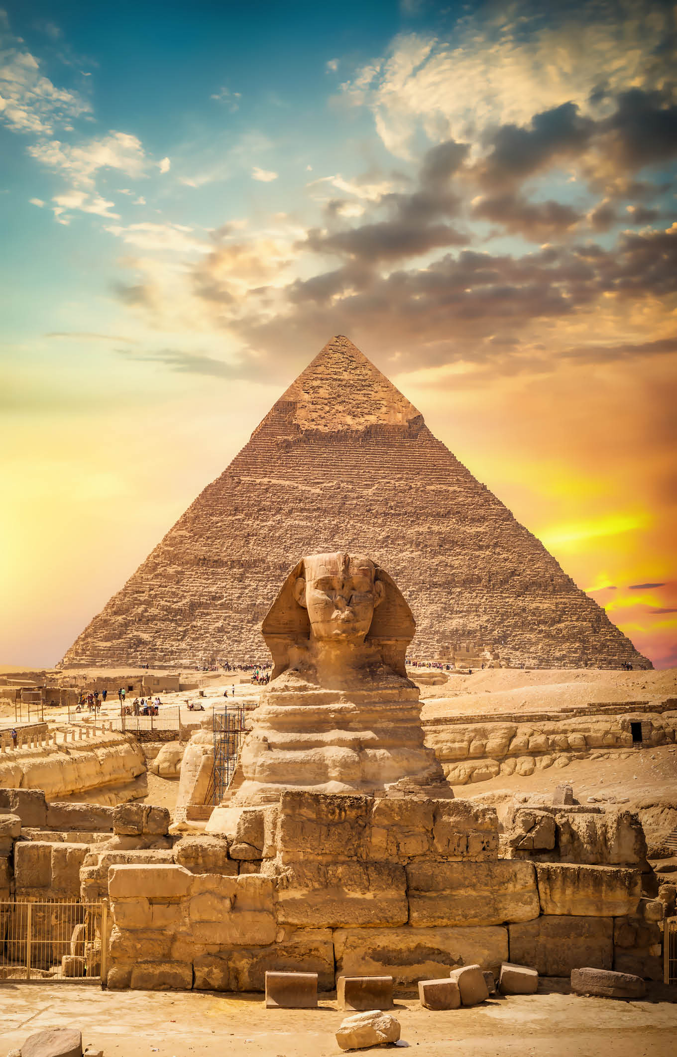 Great sphinx and pyramid under bright sun