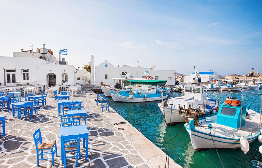 Greek fishing village in Paros, Naoussa, Greece. Popular touristic destination