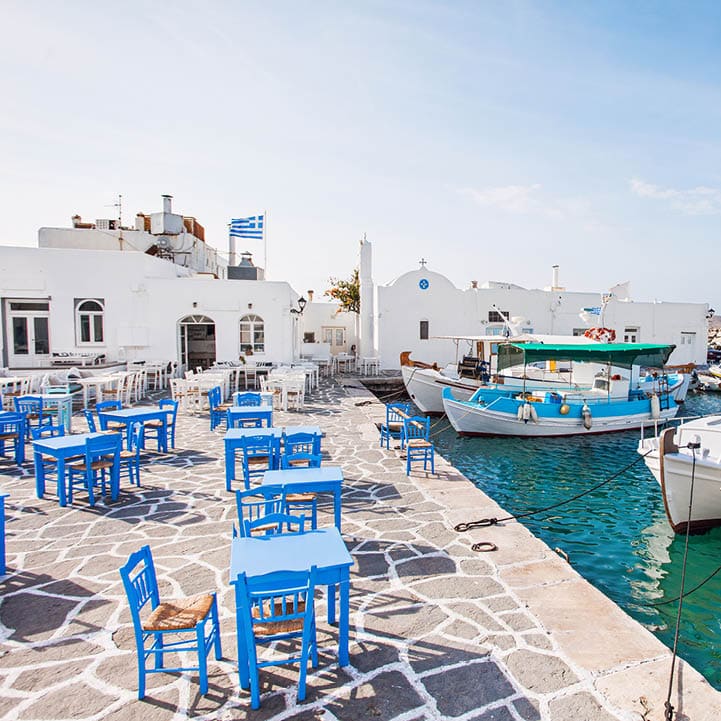 Greek fishing village in Paros, Naoussa, Greece. Popular touristic destination