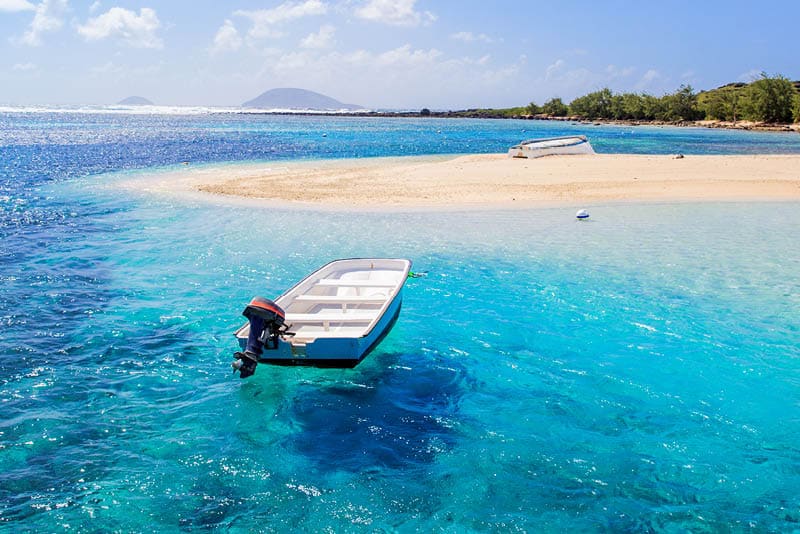 Beautiful coastline of Gabriel island (Mauritius). view from the aproaching boat.