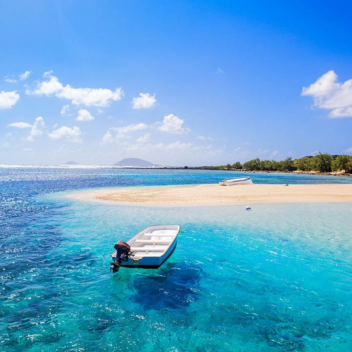 Beautiful coastline of Gabriel island (Mauritius). view from the aproaching boat.