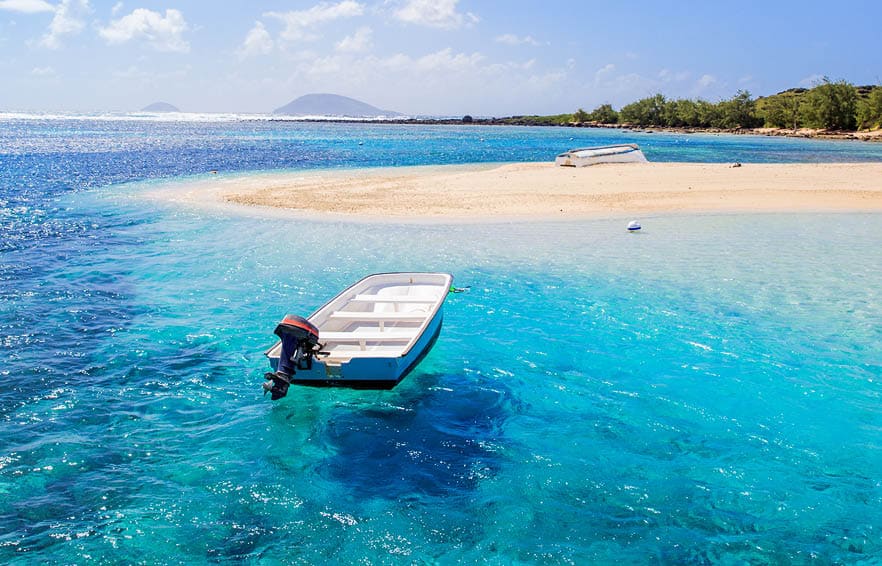 Beautiful coastline of Gabriel island (Mauritius). view from the aproaching boat.