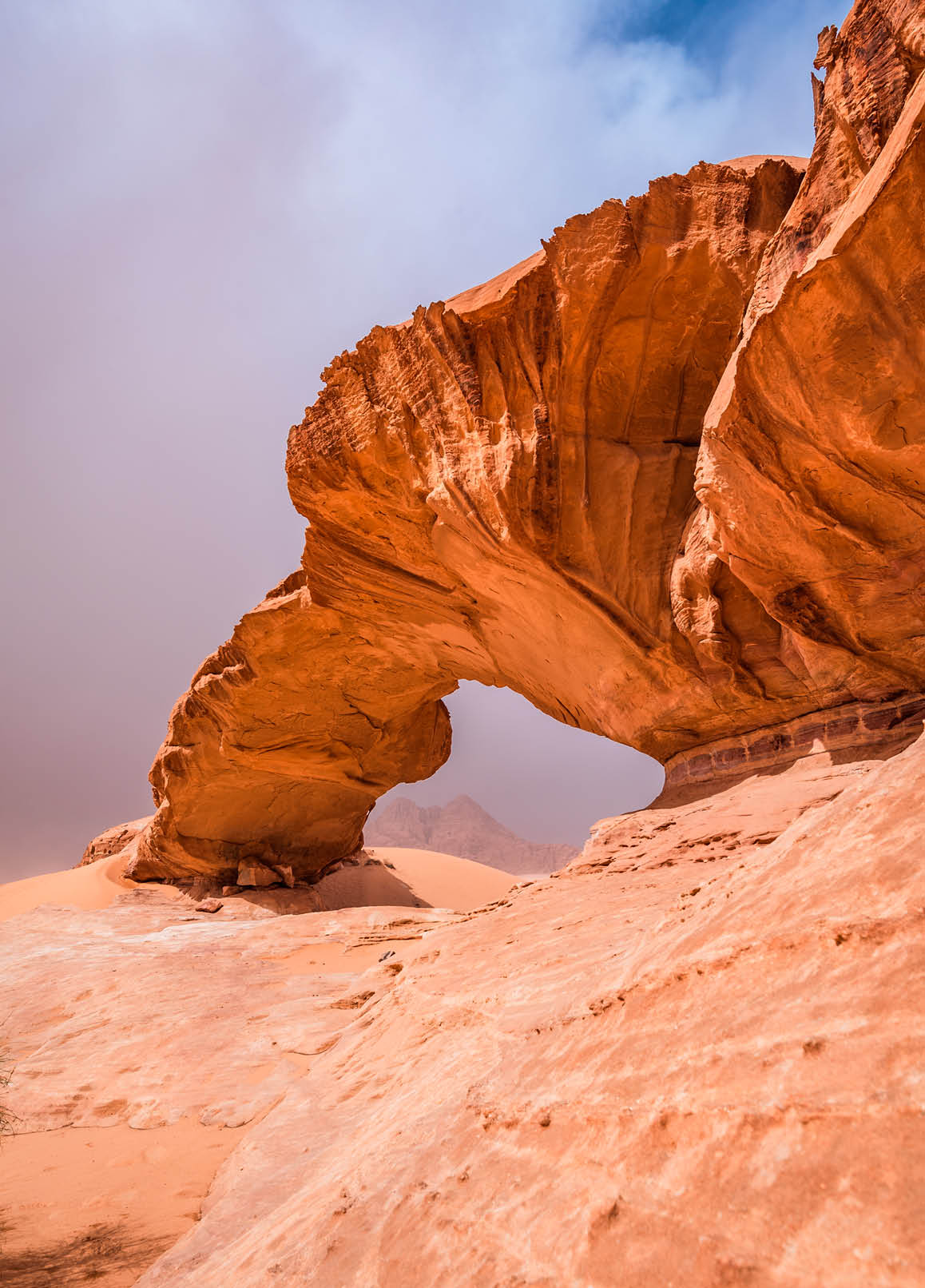 Wadi Rum, Jordan. Kharaz rock bridge world wonder in Valley of the Moon of Arabia desert.