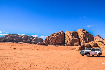 Desert safari - offroad vehicle in the UNESCO world heritage site Wadi Rum desert, Jordan