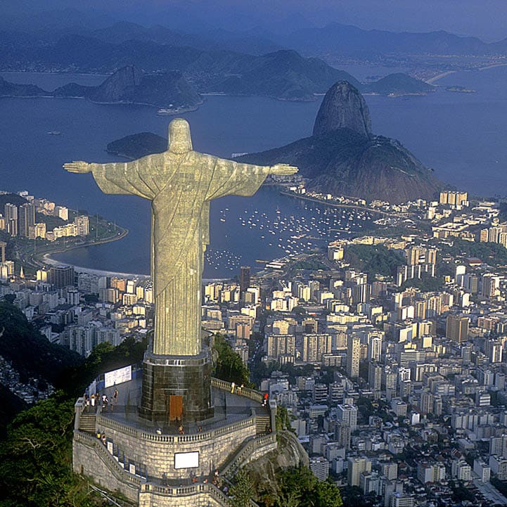 Rio de Janeiro, RJ, Brazil: Aerial view of Christ, symbol of Rio de Janeiro, standing on top of Corcovado Hill, overlooking Guanabara Bay