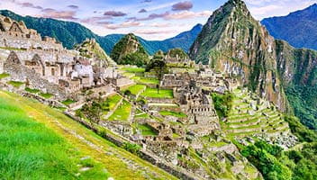 Machu Picchu in Peru - Ruins of Inca Empire city and Huaynapicchu Mountain in Sacred Valley, Cusco, South America.