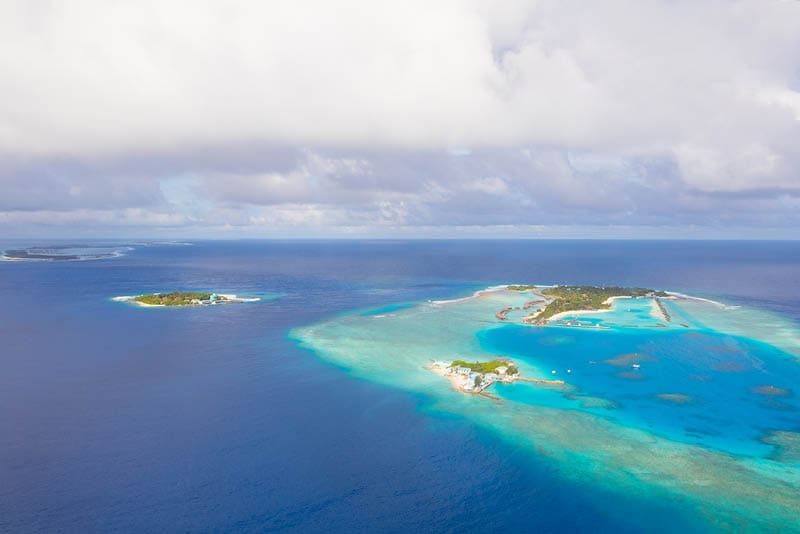 Aerial view on Maldives island, Raa atol