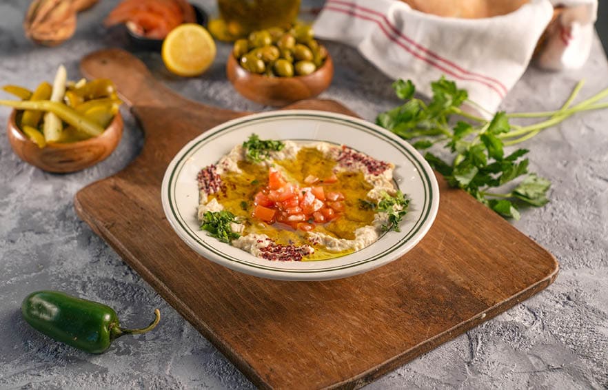 Mutabal has only roasted eggplant, tahini, olive oil, parsley and garlic        