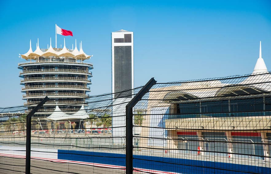 Gate at the Pit Lane of Bahrain International Circuit, open-wheel single-seater racing car Racing Track. Control Tower with Bahrain Flag. Kingdom of Bahrain, Middle East.