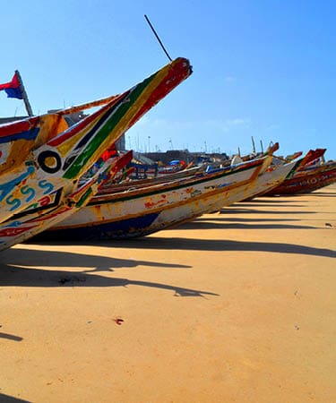 The former capital of Senegal with its colorful fishing boats