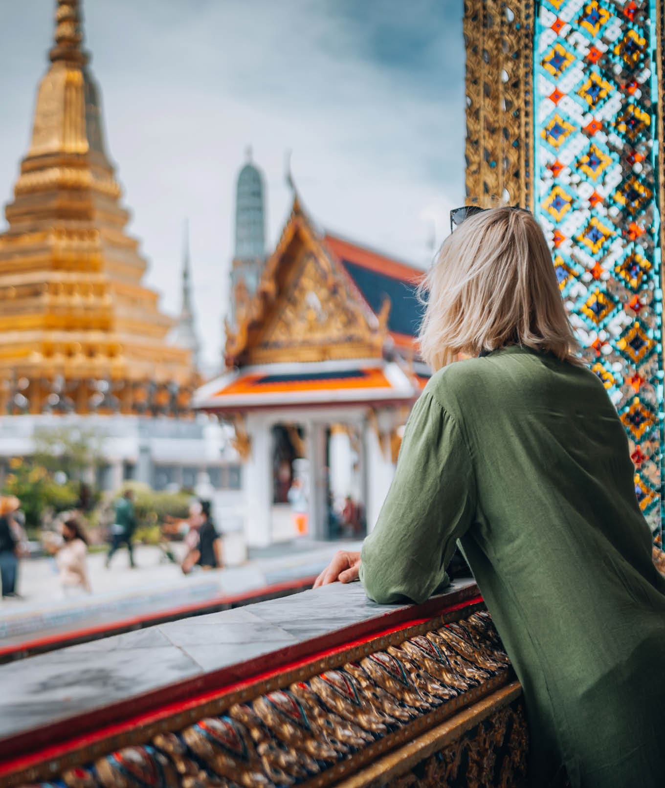 Young woman exploring Grand Palace and Wat Phra Kaew in Bangkok, Thailand
