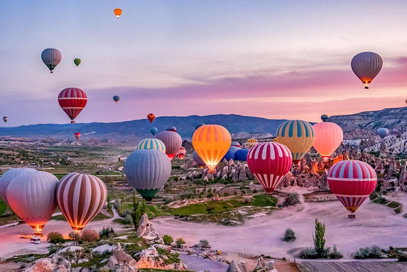 Colorful hot air balloons before launch in Goreme national park, Cappadocia, Turkey
