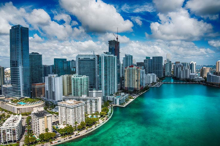The beautiful skyline of Miami, Florida shot during a helicopter photo flight about 500 feet over the Biscayne Bay.