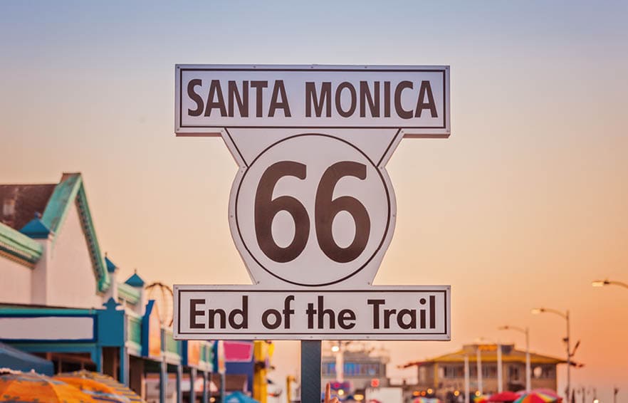 Historic Route 66 sign on pierce of Santa Monica California