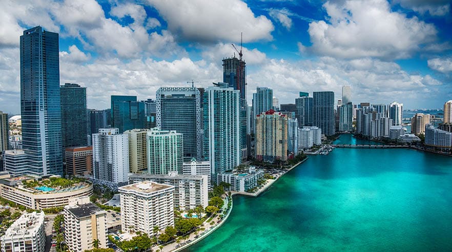 The beautiful skyline of Miami, Florida shot during a helicopter photo flight about 500 feet over the Biscayne Bay.